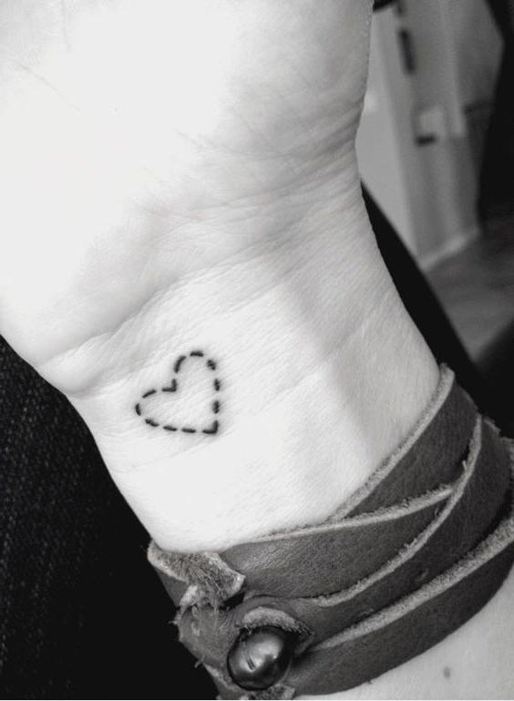 Dotted Small Heart Tattoo On a Wrist
