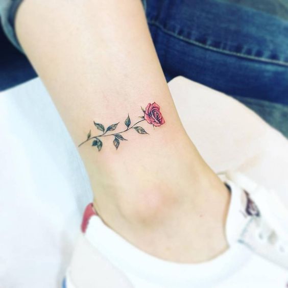 Red rose tattoo on the ankle by Artist Tattooist Up