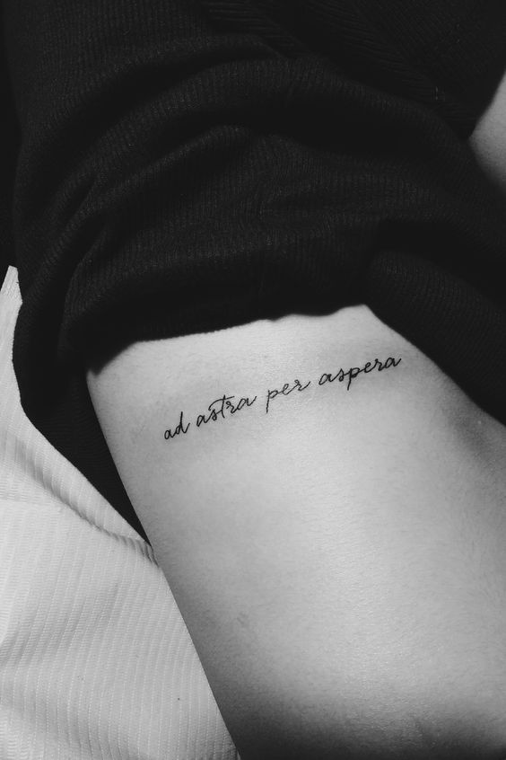 Ad astra per aspera latin quote tattoo on the rib