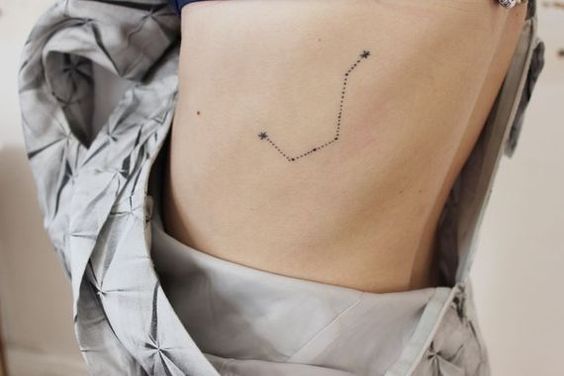 Constellation tattoo on the left side