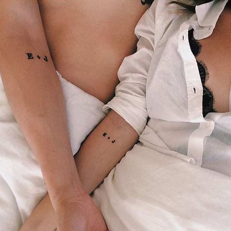 Cute matching initials tattoo for a couple