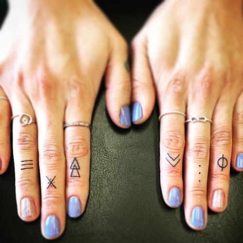 Minimal finger tattoos