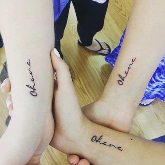 Ohana tattoo on wrists for sisters