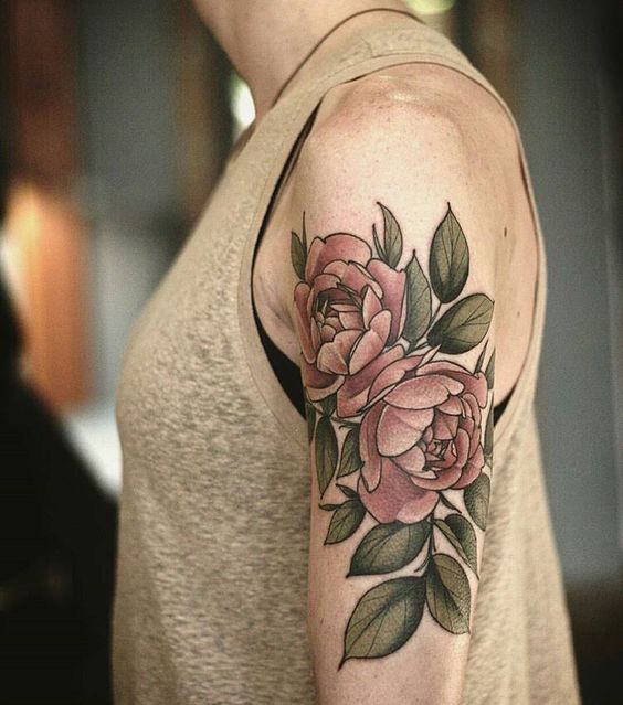 Rose tattoo by Alice Carrier