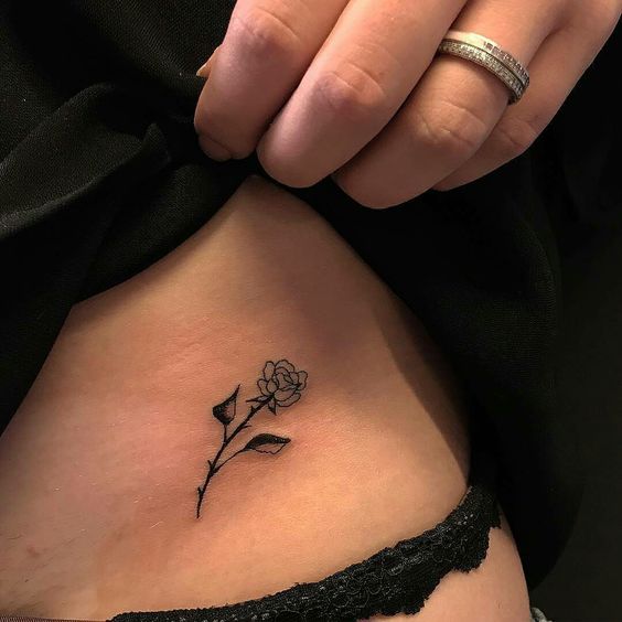 Sexy small rose tattoo