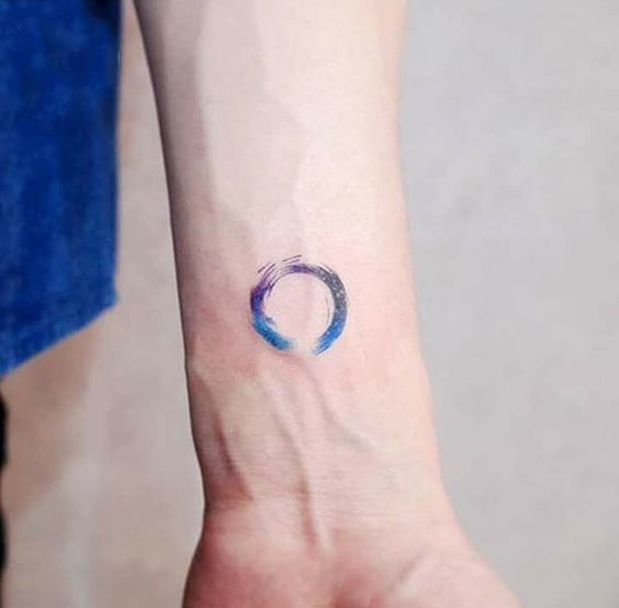 Small Watercolor Circle Tattoo by Witty Button