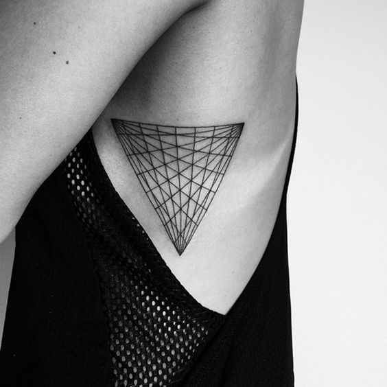 Triangle tattoo on the rib