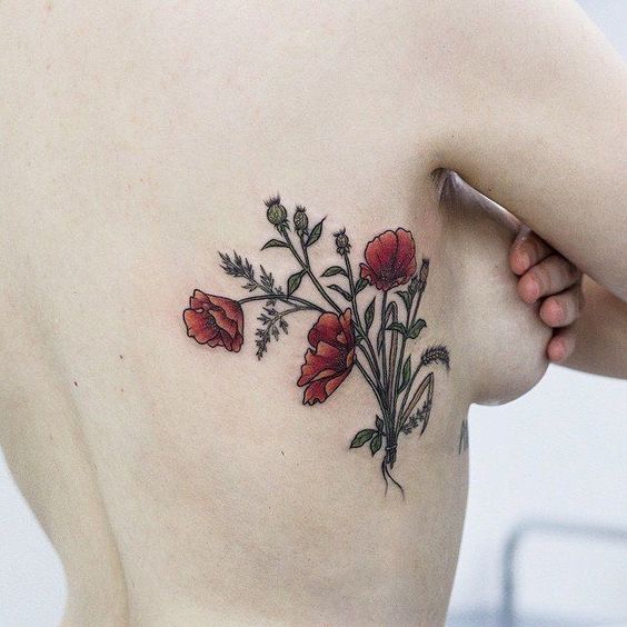 Wildflowers tattoo on the right rib