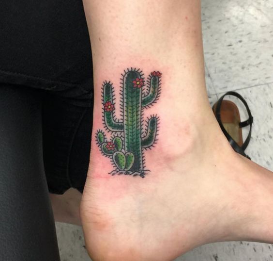 Another cool small cactus tattoo on an ankle by Daniel Ward