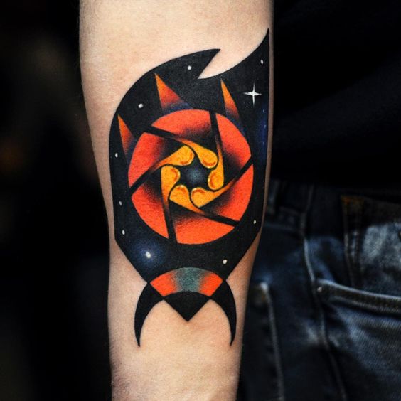 Aperture-asteroid tattoo on the inner arm by David Cote