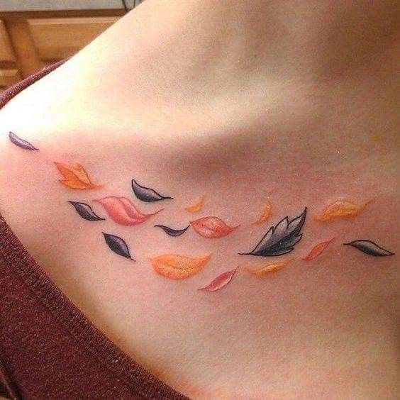 Autumn leaves tattoo on the clavicle