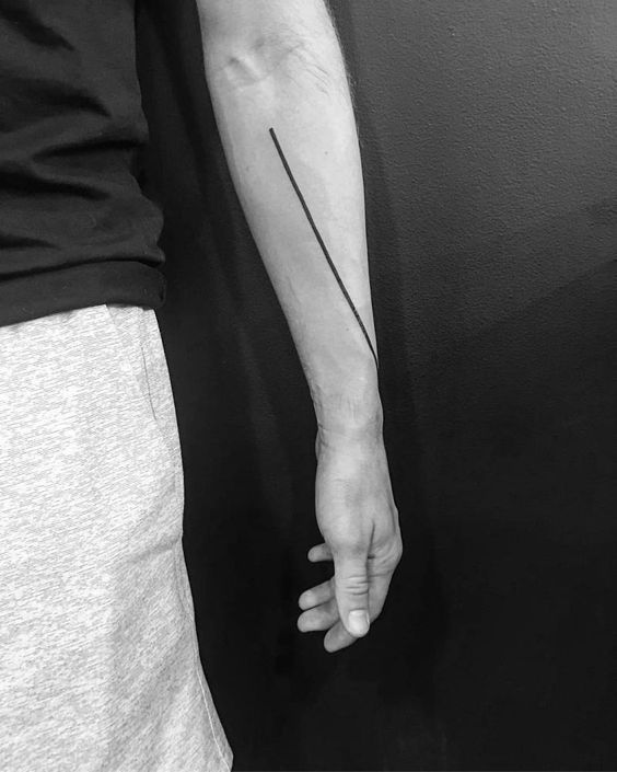 Black solid line tattoo over the arm