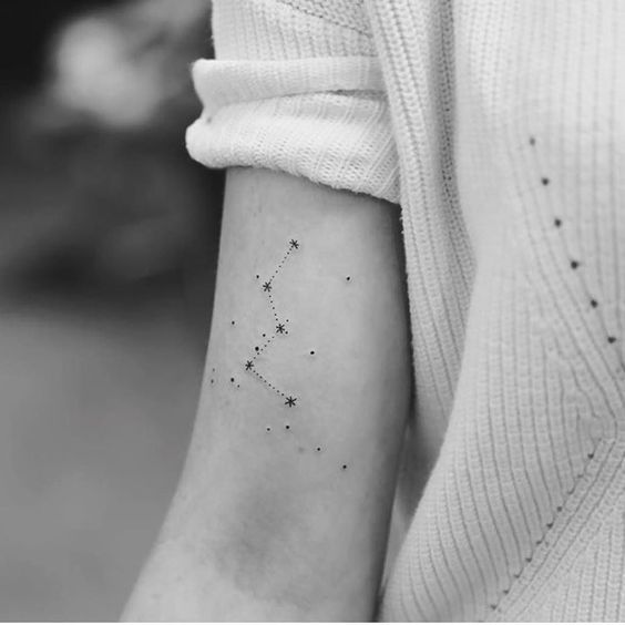 Constellation tattoo on the arm by Joice Wang