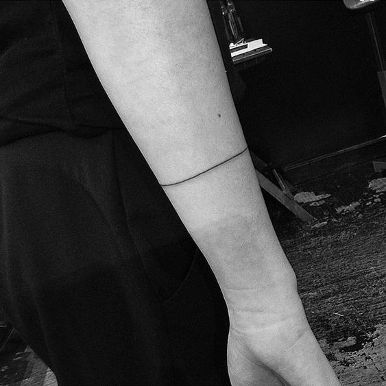 Extremely thin armband tattoo