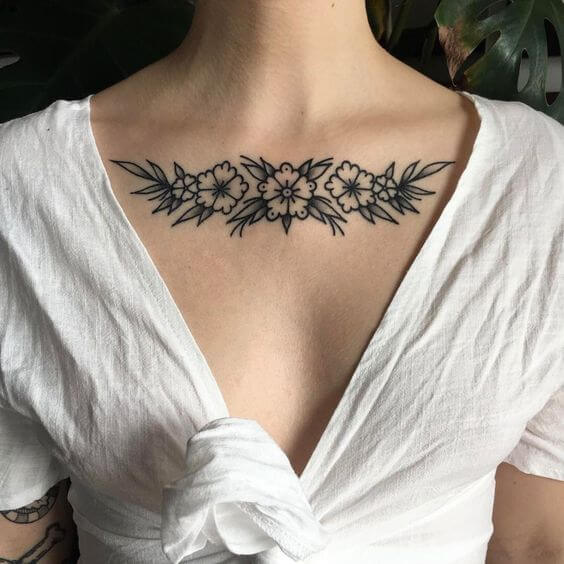 Gorgeous floral tattoo on the clavicle