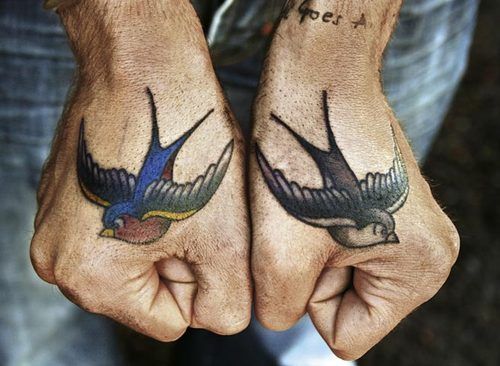 Gorgeous swallow tattoos on hands
