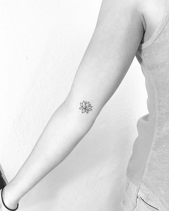 Lotus flower tattoo on the arm