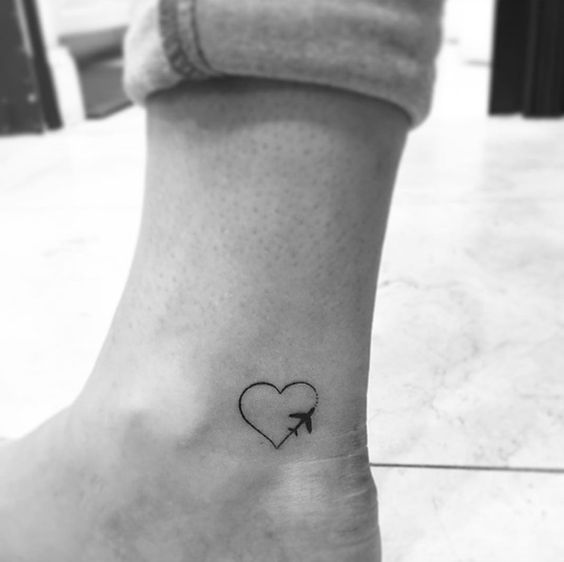 Love to travel tattoo idea on an inner ankle