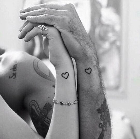 Matching heart tattoo on wrist for couples