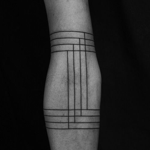 Minimal lines tattoo on the arm