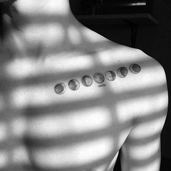 Moon phases tattoo on the collarbone