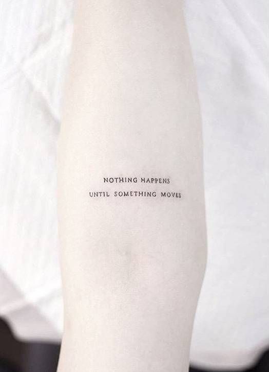 Nothing happens until something moves quote tattoo on the arm