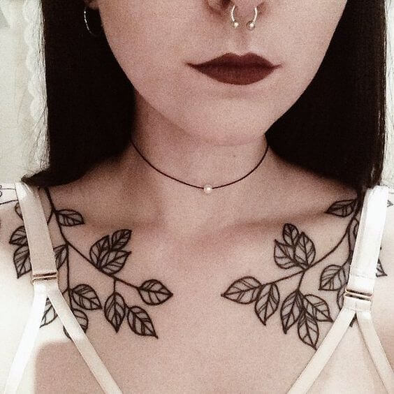 Outline leafs tattoo on clavicle bone