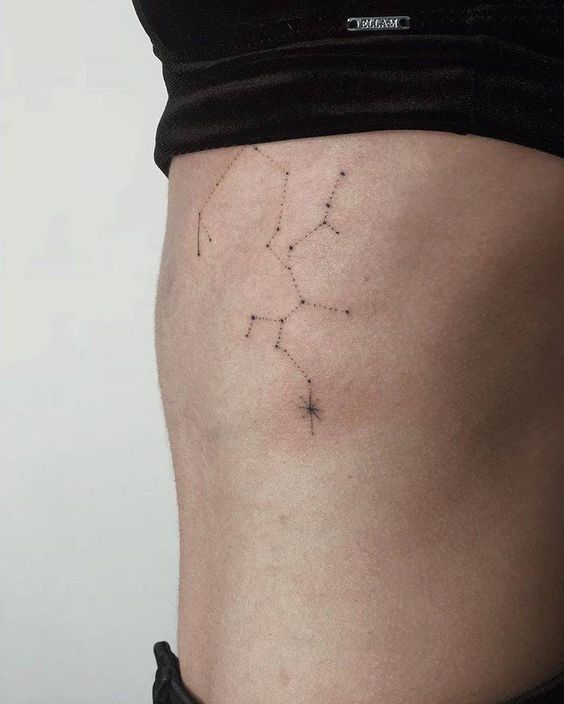Sagittarius constellation tattoo on the ribcage