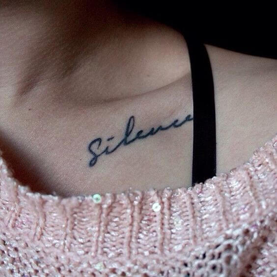 Silence tattoo on the clavicle