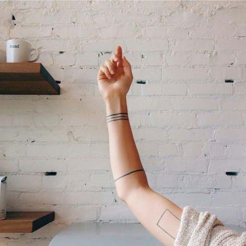 Simple arm tattoos