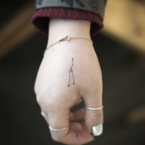 Taurus constellation tattoo on the hand