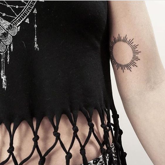 Thin line small sun tattoo design