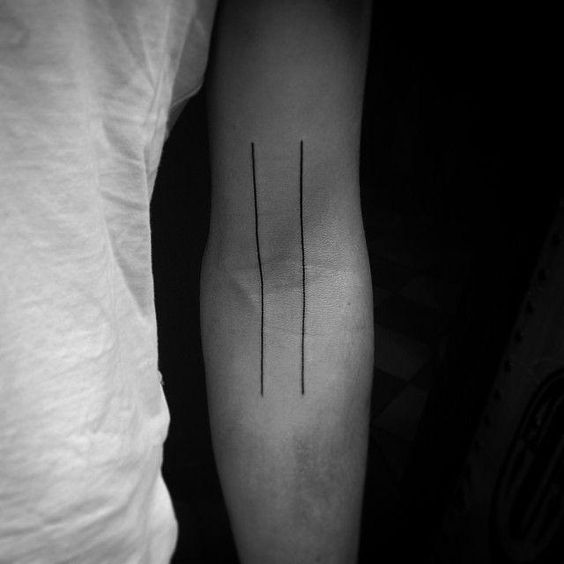 Two simple lines tattoo on the inner arm