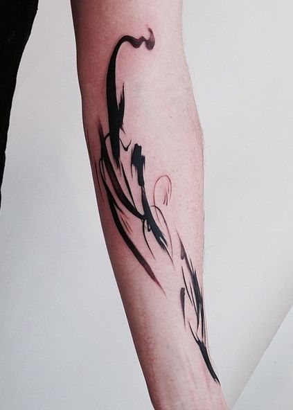 Calligraphy tattoo on the arm