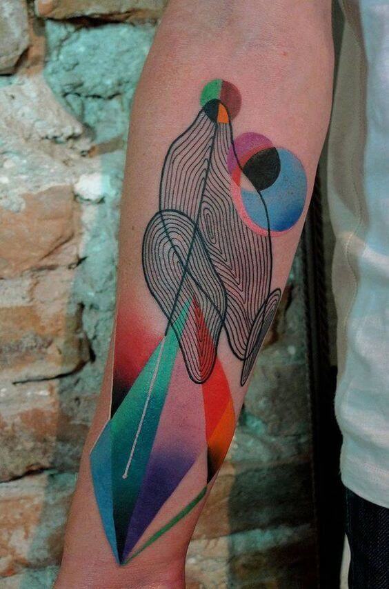 Colorful abstract arm tattoo