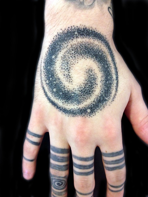 Dot-work black spiral galaxy tattoo