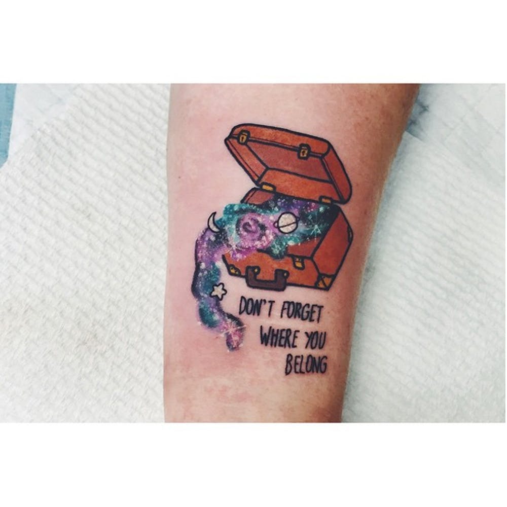 Galaxy tattoo with a quote