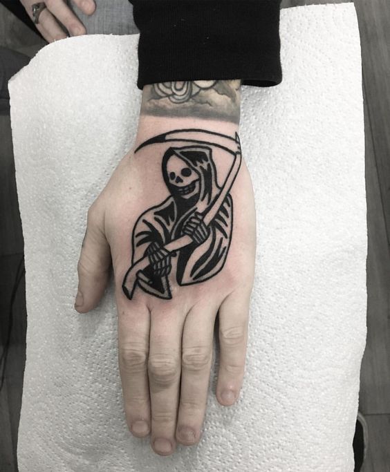 Grim reaper tattoo on the hand