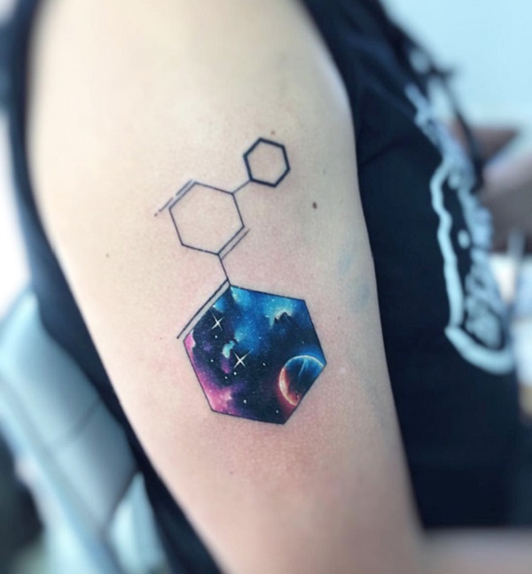 Space scenery in a hexagon tattoo