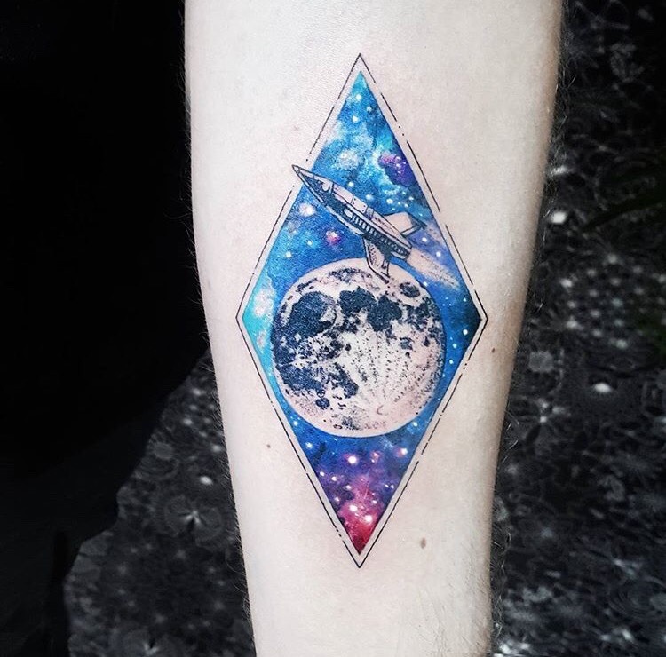 Spaceship and moon tattoo
