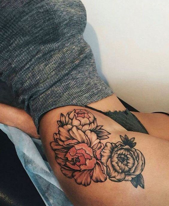 Absolutely excellent floral hip tattoo