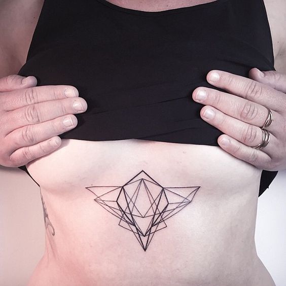 Abstract geometric shape sternum tattoo