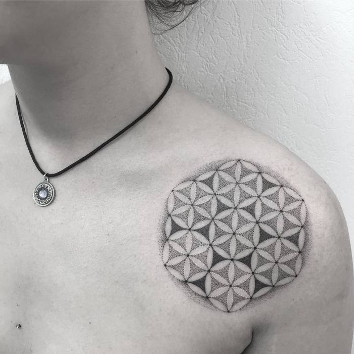 Another dotwork style flower of life tattoo on the left shoulder