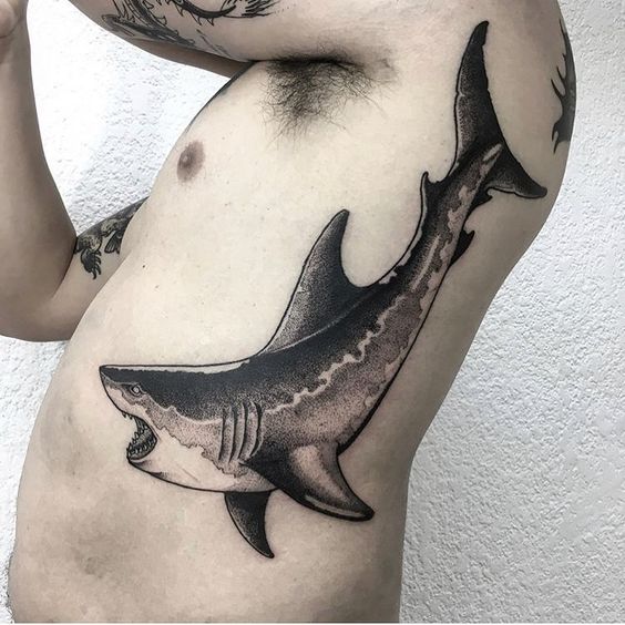 Another realistic shark tattoo on the left side