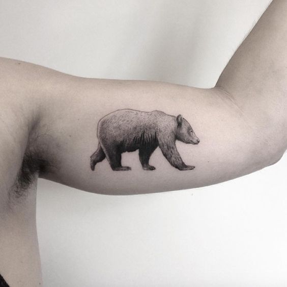 Black and grey bear on the left bicep
