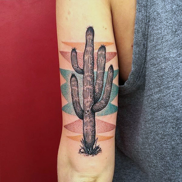 Black cactus with native american pattern tattoo on the left tricep