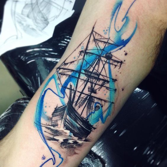 Black dead ship and watercolor splash tattoo on the right arm