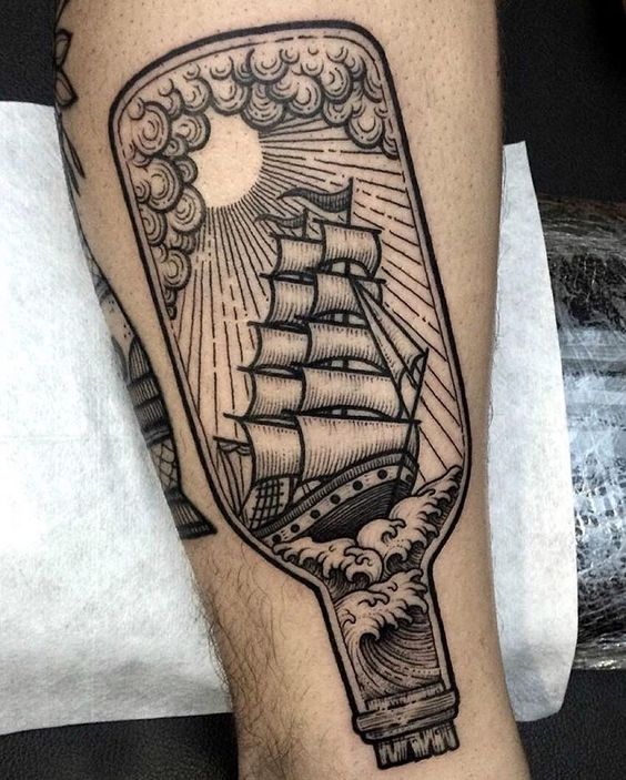 Black tattoo of a ship in a bottle