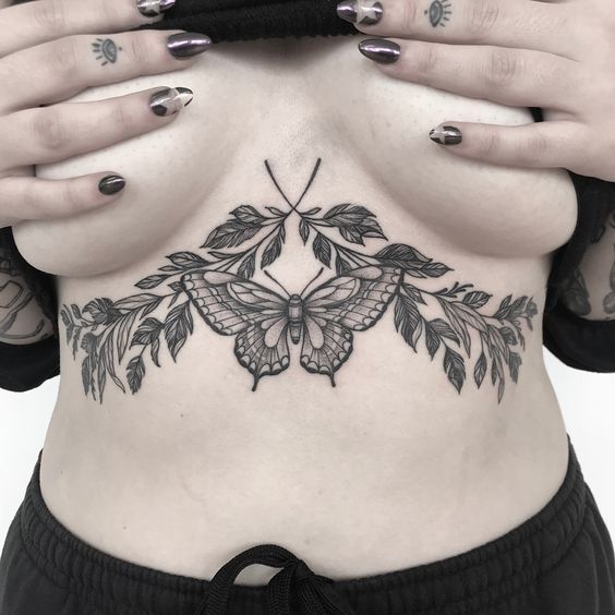 Butterfly and branch with leaves sternum tattoo
