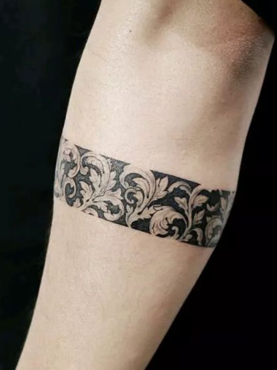 Carved stone baroque style flowers armband tattoo